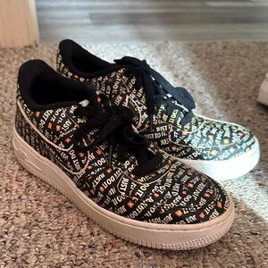 Nike Air Force 1 Black and Orange 'Just Do It' Sneakers